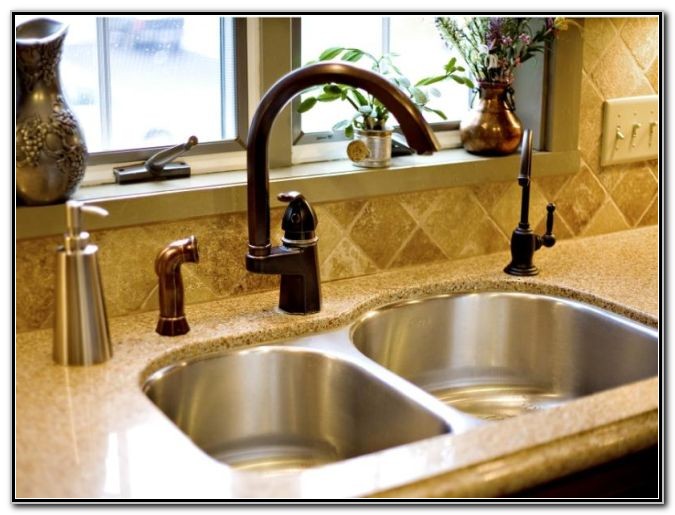 Stainless Steel Sink With Bronze Faucet ERIGIESTUDIO   Stainless Steel Sink Bronze Faucet 