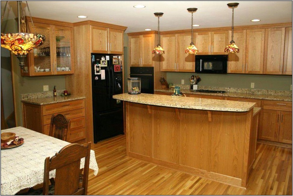 Honey Oak Cabinets With Black Granite Countertops - Cabinet : Home ...